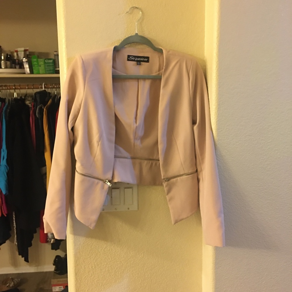 A pink blazer